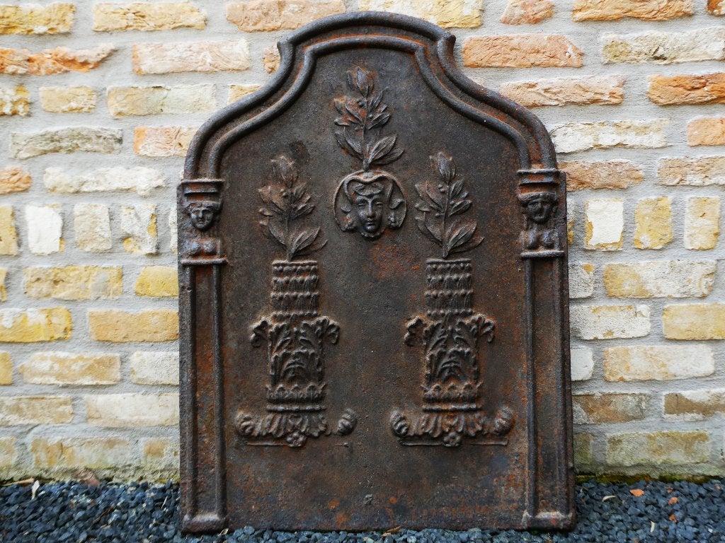 Grote antieke haardplaat met bloemenvazen en Minerva haard, Ophalen of Verzenden