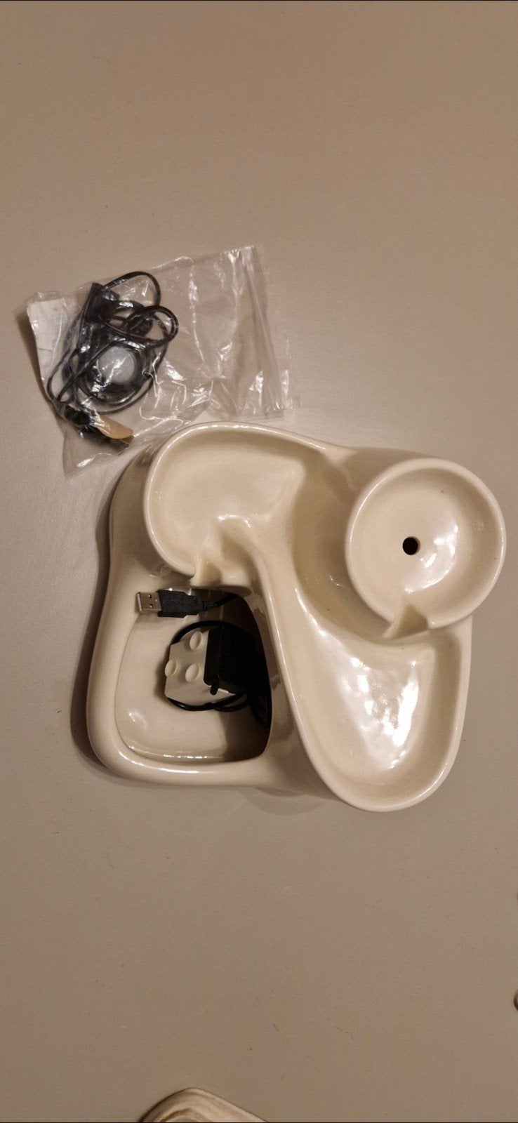 keramische drinkfontein miaustore, Ophalen