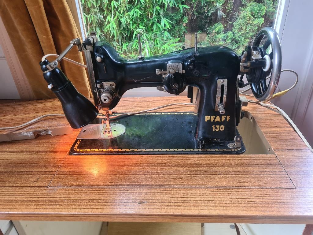 naaimachine in kast, Ophalen