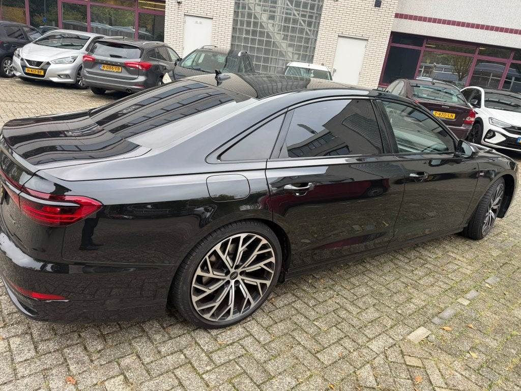 Audi A8 L 60 Tfsi e 449pk Tiptronic Quattro 2025 Zwart, Auto's, Automaat, Zwart, 48 km/l, Vierwielaandrijving