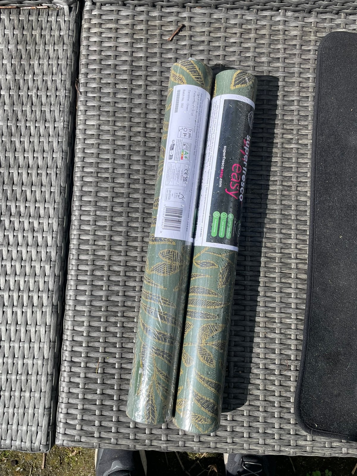 2x rollen behang van Karwei, Ophalen