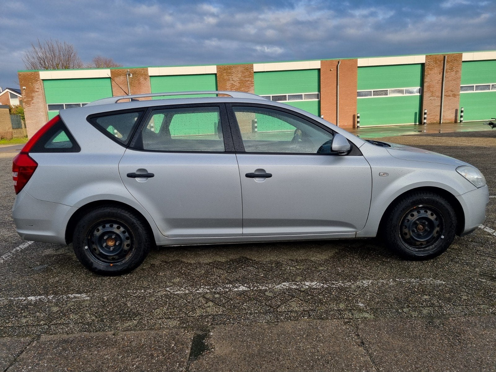 Kia (Pro) Cee d 1.4 Sporty Wagon 2009 Grijs, Auto's, Voorwielaandrijving, Stof, Start-stop-systeem, 4 cilinders