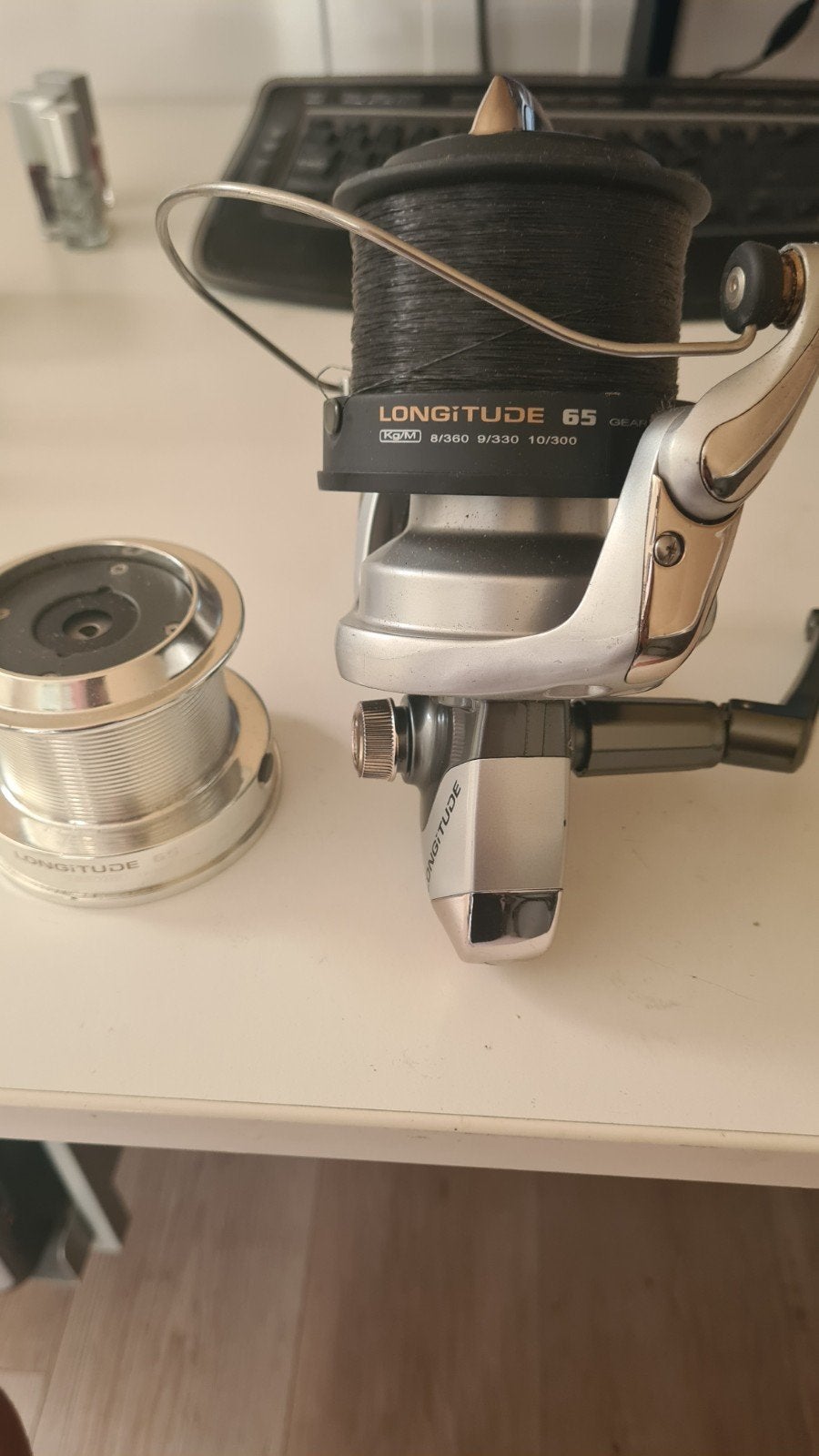 Okuma Longitude 65 Molen met extra spoel, Ophalen of Verzenden, Gebruikt, Molen