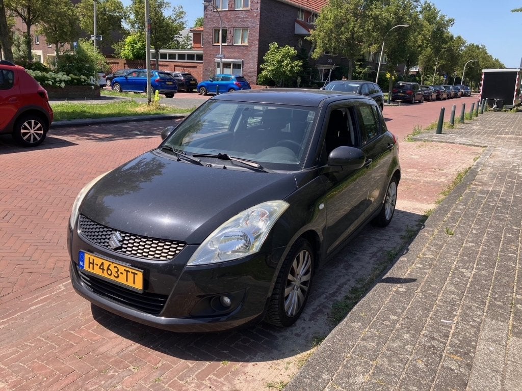 Suzuki Swift 1.2 5-D 2011 Zwart, Auto's, Suzuki, Voorwielaandrijving, Stof, 4 cilinders, 400 kg