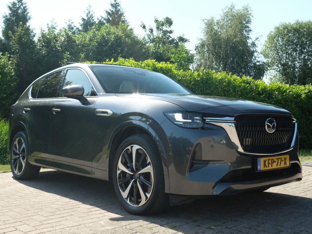 Mazda CX-60 2.5 e-SkyActiv PHEV Takumi 328 PK | Wegklapbare, Auto's, Mazda, Automaat, Stof, Gebruikt, 2500 kg
