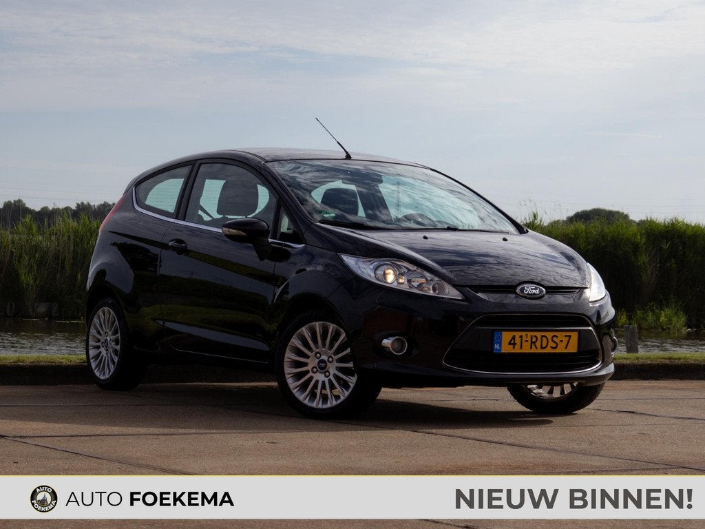 Ford Fiesta 1.25 Titanium Airco LMV 15", Auto's, Voorwielaandrijving, Stof, Gebruikt, 4 cilinders