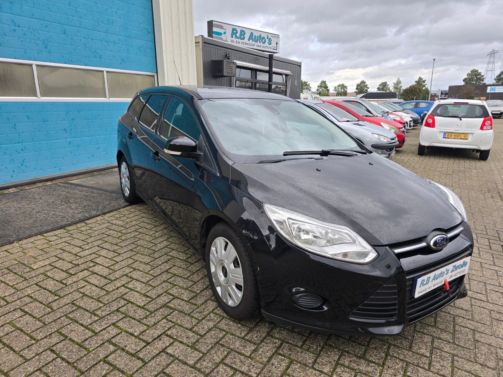 Ford Focus 1.6 Tdci 77KW Wagon 2013 Zwart, Stof, Zwart, 4 cilinders, Zwart