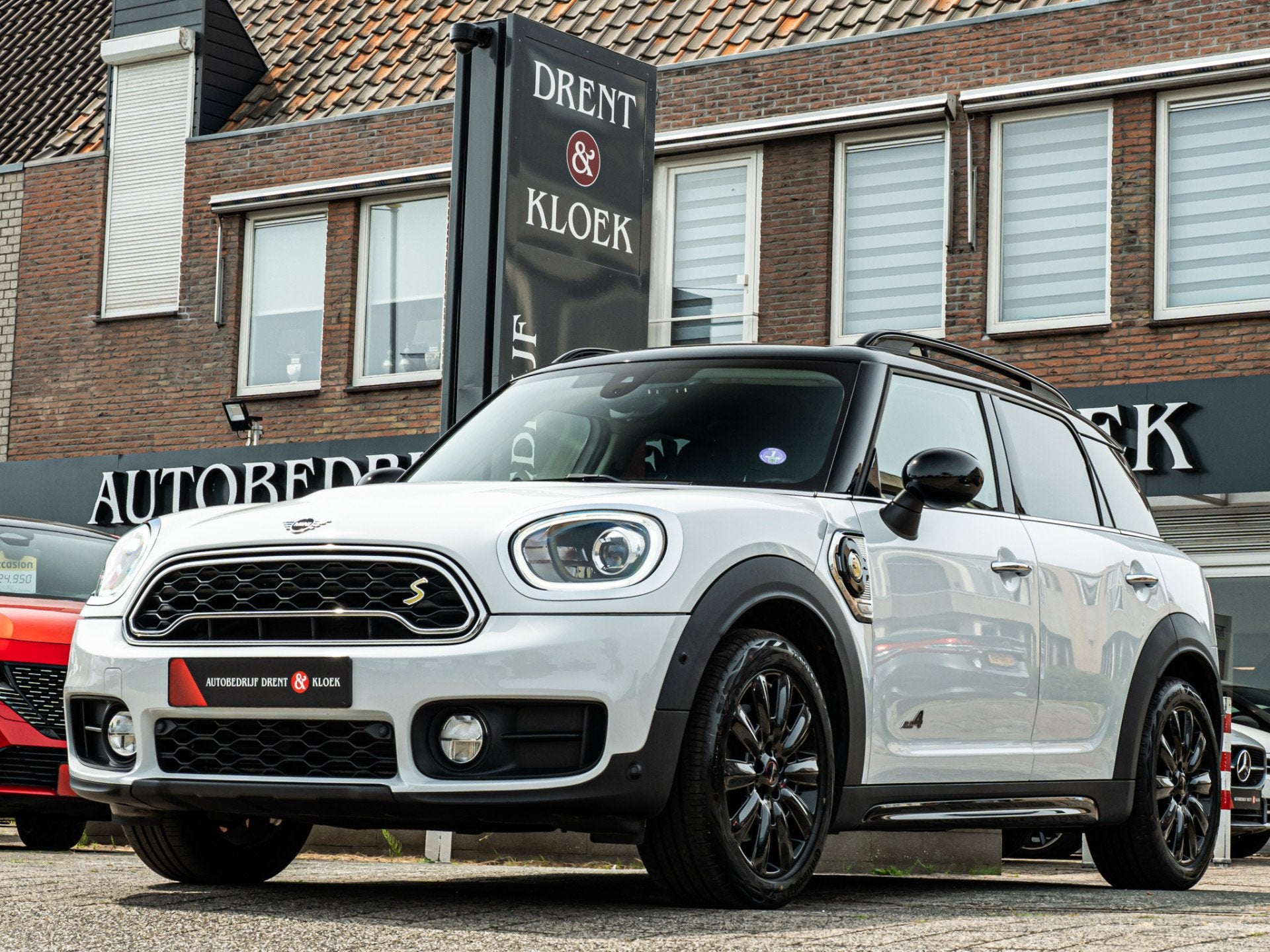 MINI Countryman 1.5 Cooper S E ALL4 Chili 18 INCH LED ADAP C, Auto's, Mini, Gebruikt, Euro 6, Leder en Stof, Wit