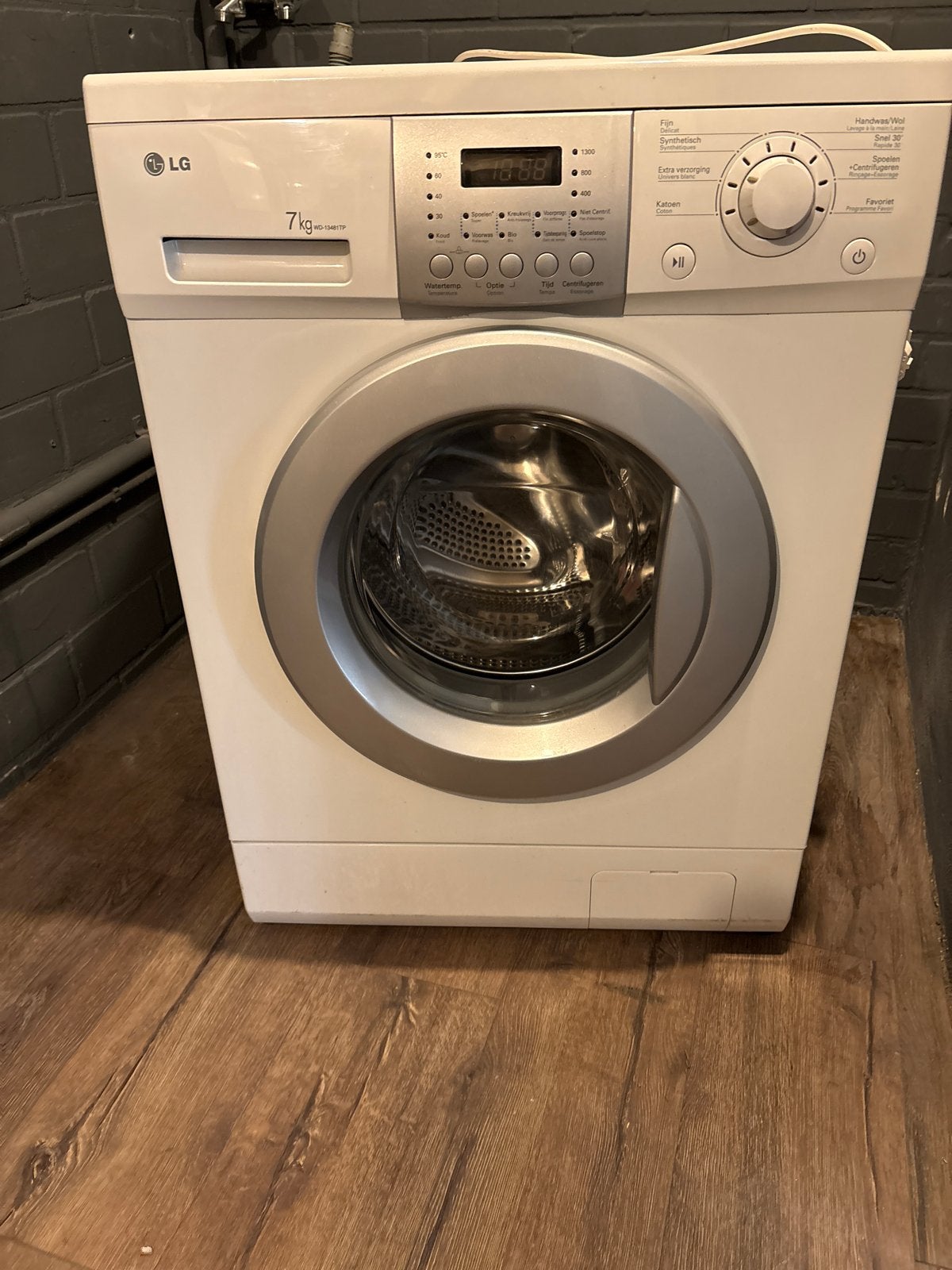 LG WD-13481TP Wasmachine - 7kg - Centrifugeert soms niet, Ophalen, Gebruikt, Voorlader, 85 tot 90 cm