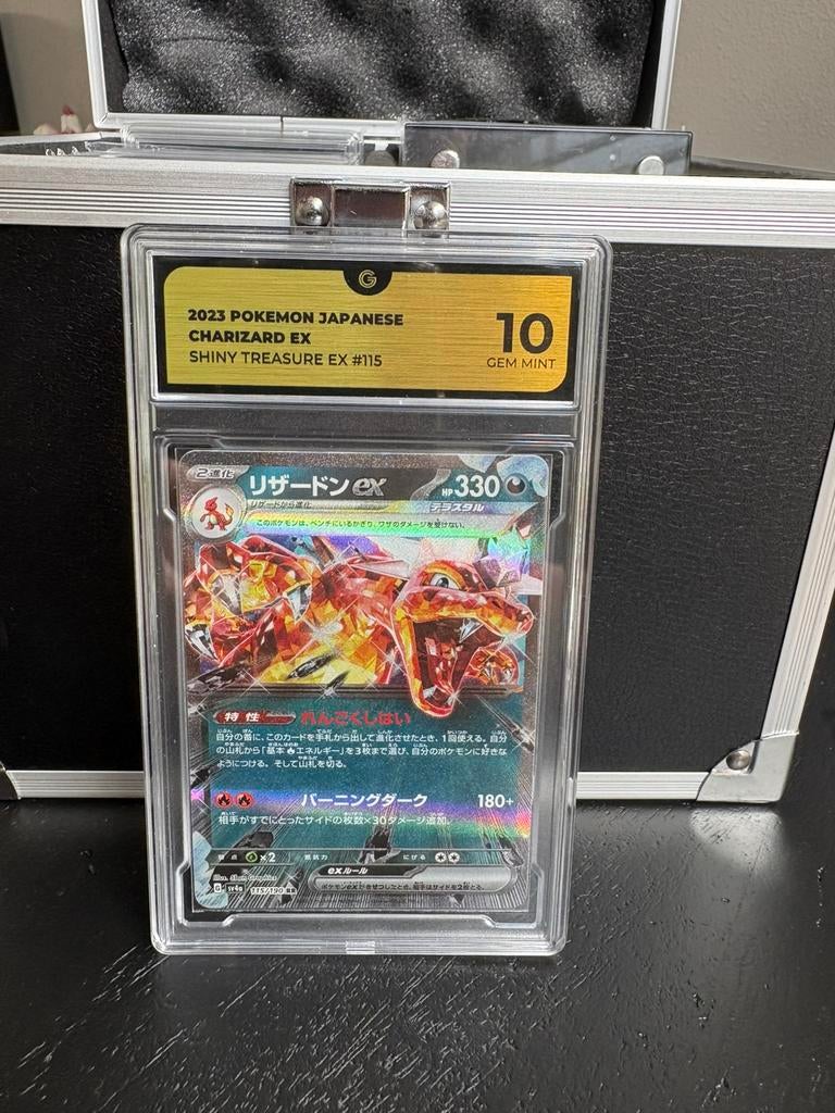 Charizard ex grade 10, Ophalen of Verzenden, Zo goed als nieuw, Meerdere kaarten, Foil