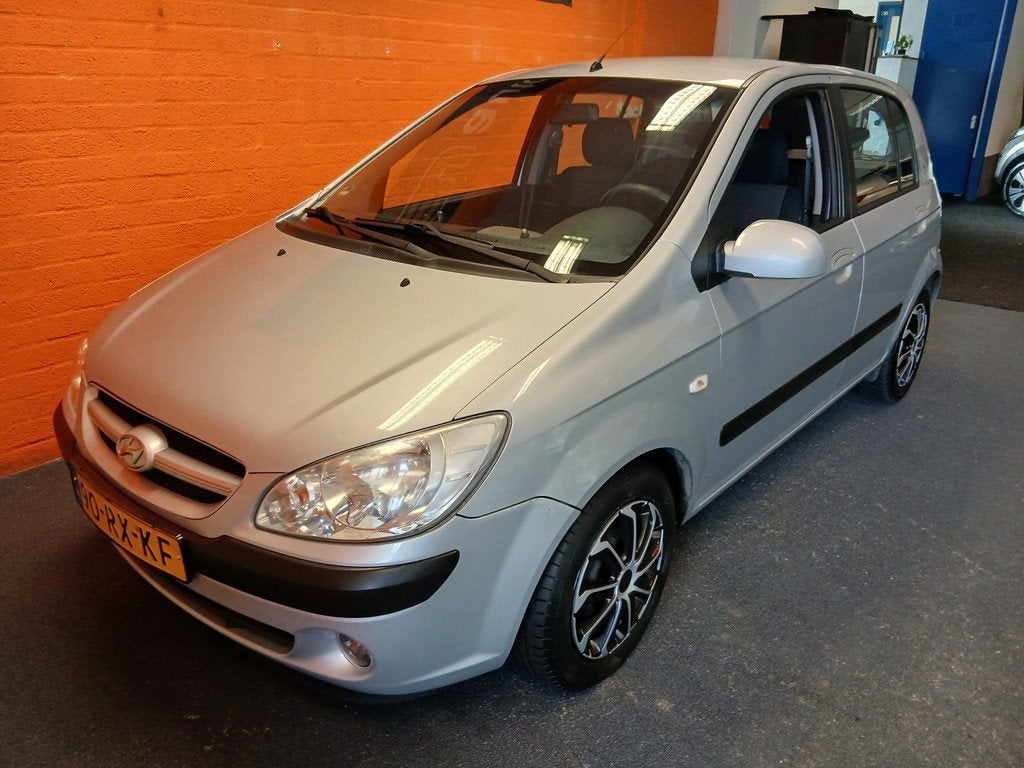 Hyundai Getz 1.4 / 5 DEURS / ACTIVE COOL / AIRCO!, Voorwielaandrijving, Zwart, 4 cilinders, Origineel Nederlands
