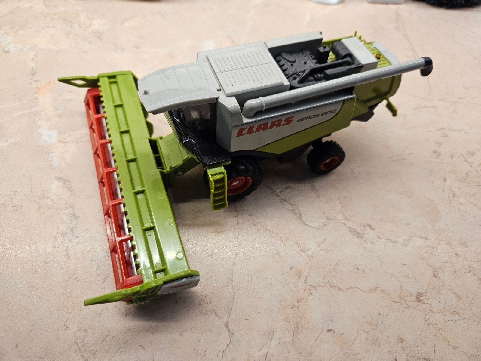 Siku Claas Lexion 600 Combine 1:50, Ophalen of Verzenden, Zo goed als nieuw, Hijskraan, Tractor of Landbouw, SIKU