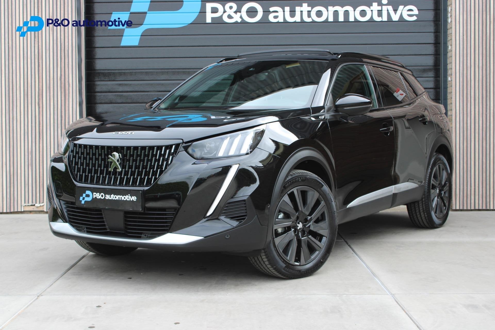 Peugeot 2008 1.2 PureTech GT PANO | ACC | Stoelverwarming, Auto's, Dealer onderhouden, Gebruikt, Zwart, Met garantie (alle)