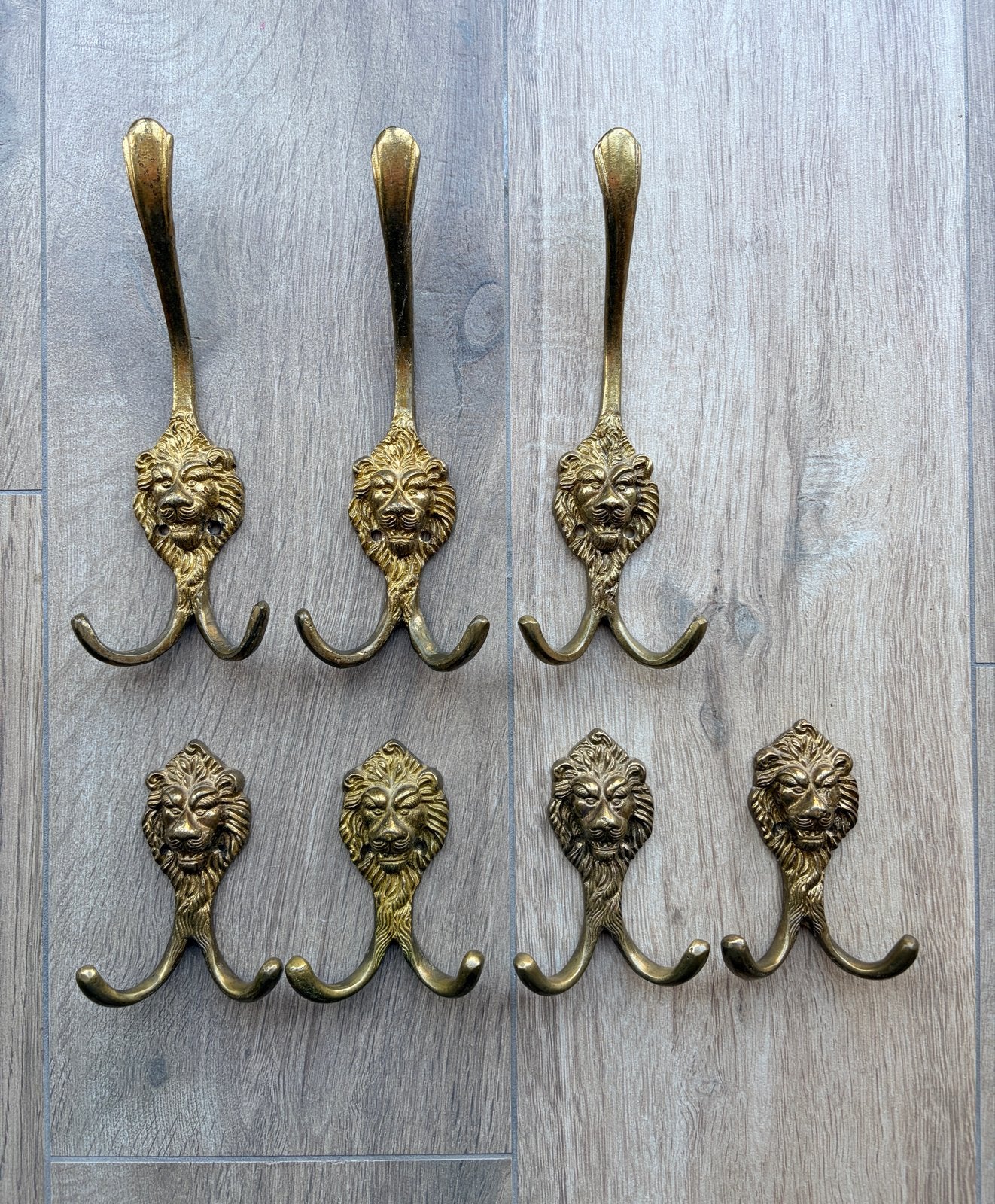 Leeuwenkop haken set van 7, Ophalen of Verzenden, Gebruikt, Metaal, Wandhaken
