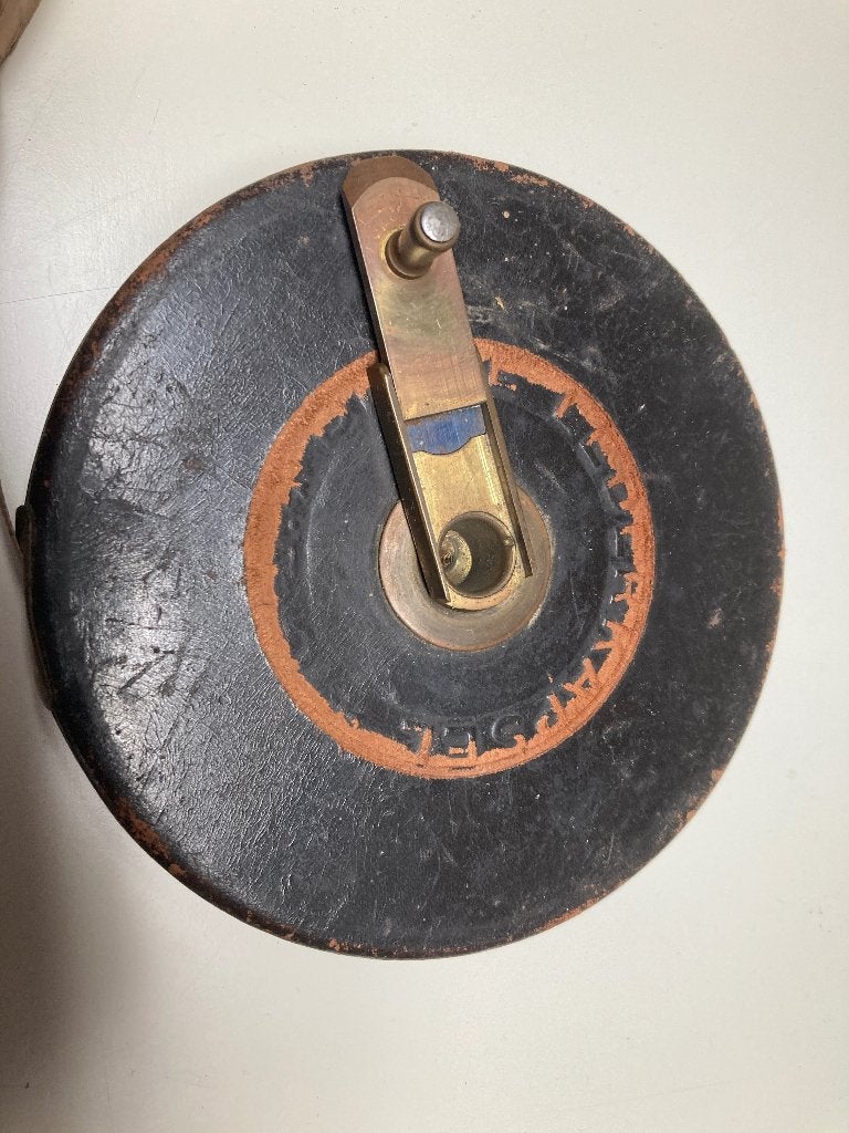 Antiek meetlint met rode adelaar logo, Ophalen of Verzenden