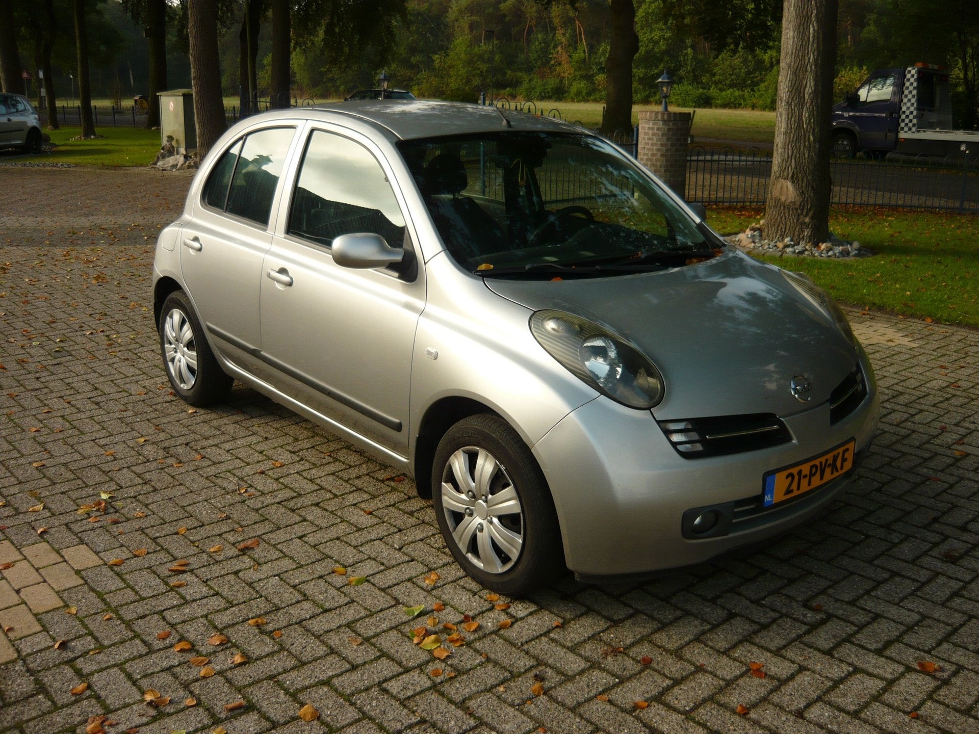 Nissan Micra 1.2 Tekna, Voorwielaandrijving, Stof, Metallic lak, 4 cilinders