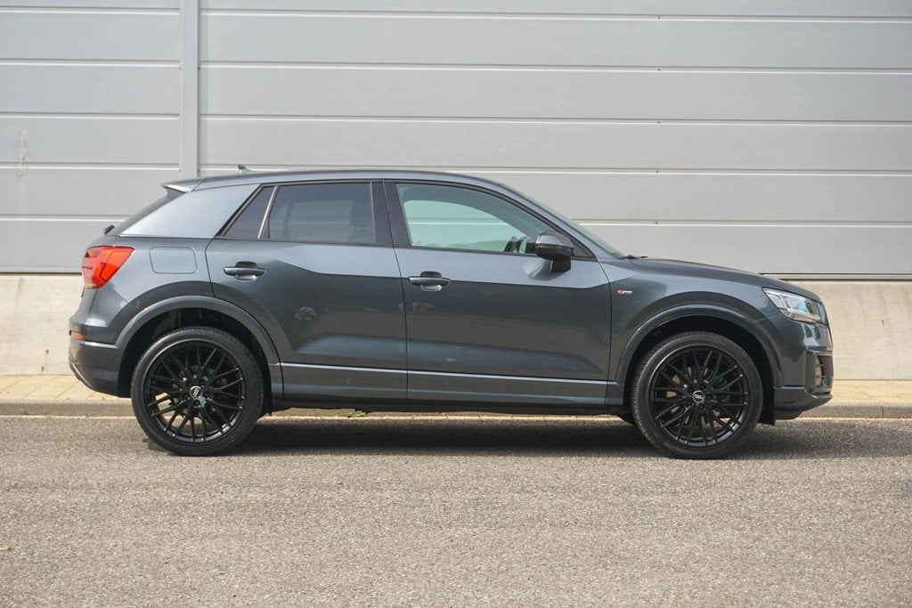 Audi Q2 2.0 TFSI 190pk S-tronic Quattro Sport Edition | Trek, Auto's, Audi, Automaat, Gebruikt, Leder en Stof, Vierwielaandrijving