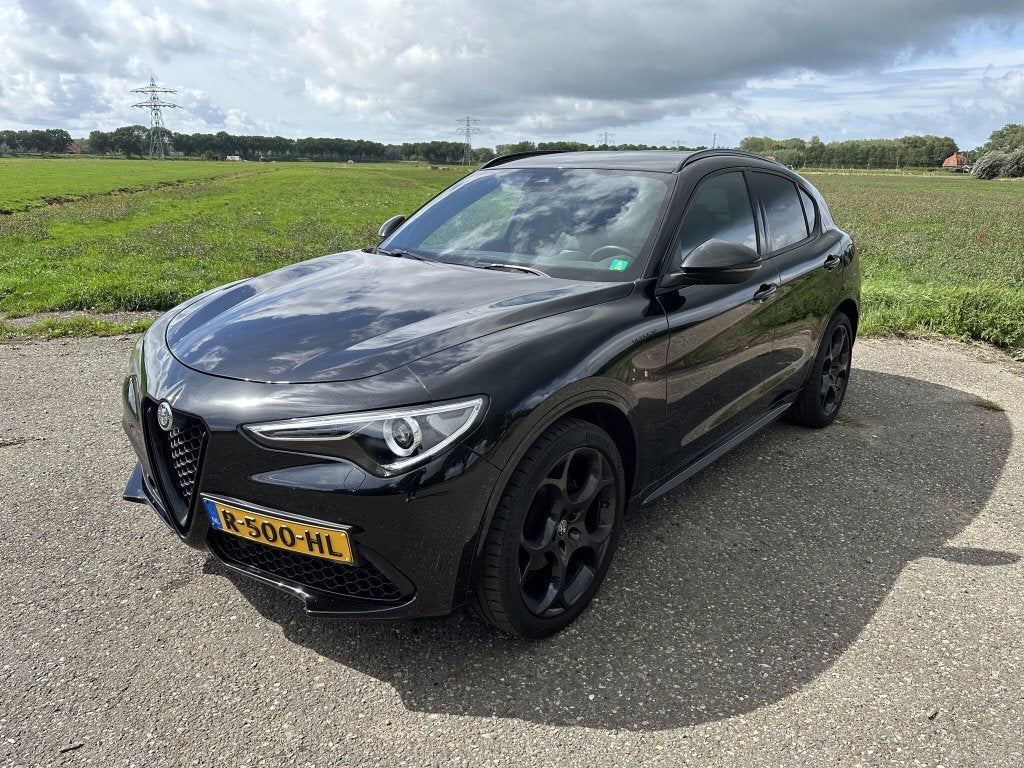 Alfa Romeo Stelvio 2.0 Veloce Q4 280pk | Ex-lease | BTW-auto, Auto's, 1995 cc, 4 cilinders, 1655 kg, Zwart