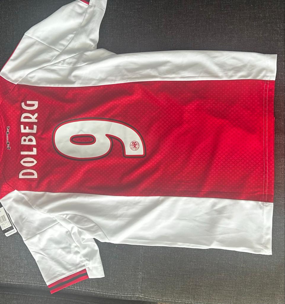 Ajax thuisshirt 25/26 Kasper Dolberg met prijskaartje, Ophalen of Verzenden, Nieuw