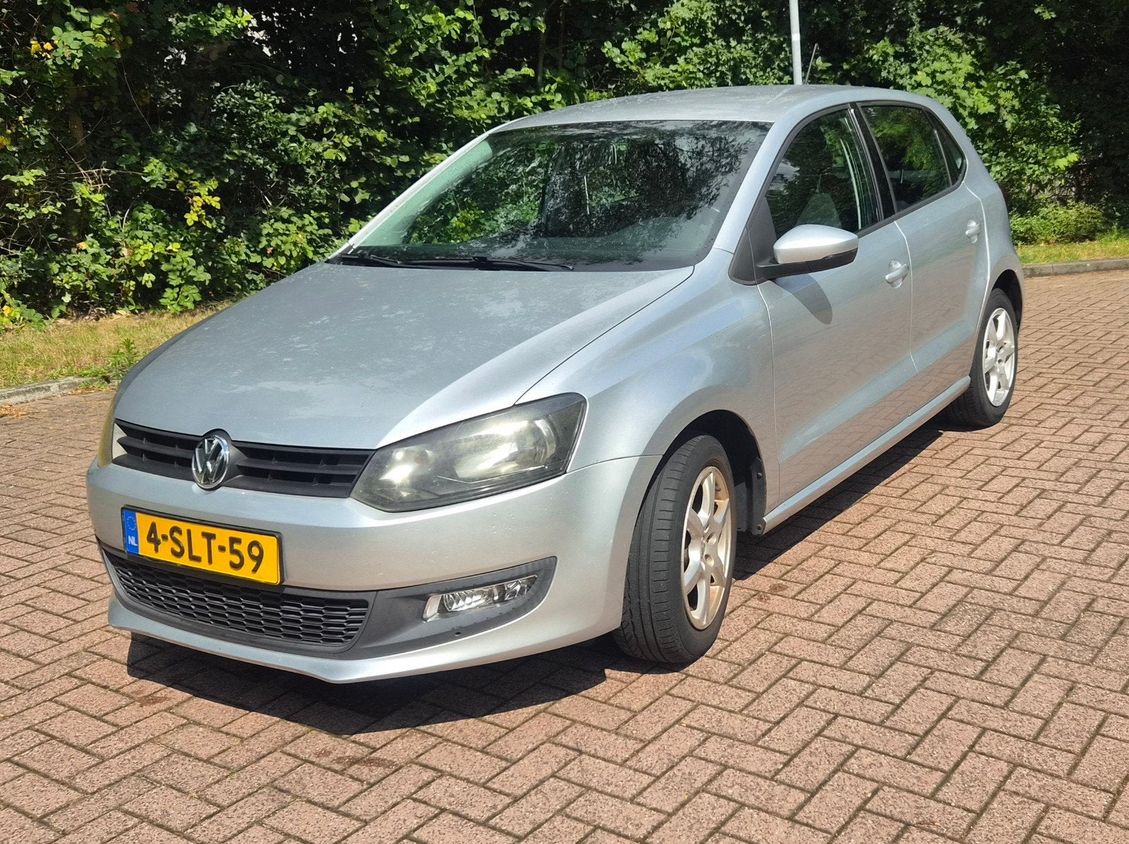 Volkswagen Polo 1.2 51KW 2012 Grijs, Auto's, Volkswagen, Voorwielaandrijving, 40 €/maand, 1198 cc, Handgeschakeld