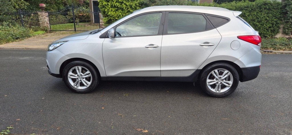 Hyundai IX35 2.0iBusiness Edition/automaat/leer/camera/trekh, Auto's, Gebruikt, Huisgarantie, 4 cilinders, Met garantie (alle)