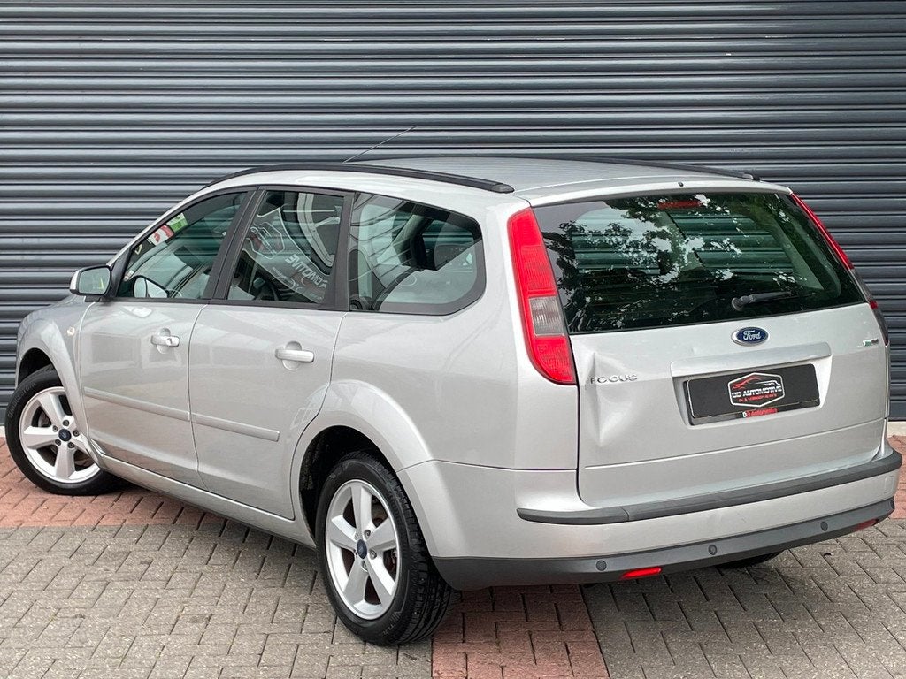 Ford Focus Wagon 1.8-16V Ambiente Flexifuel Airco | Pdc | Cr, Gebruikt, Zwart, 4 cilinders, Handgeschakeld