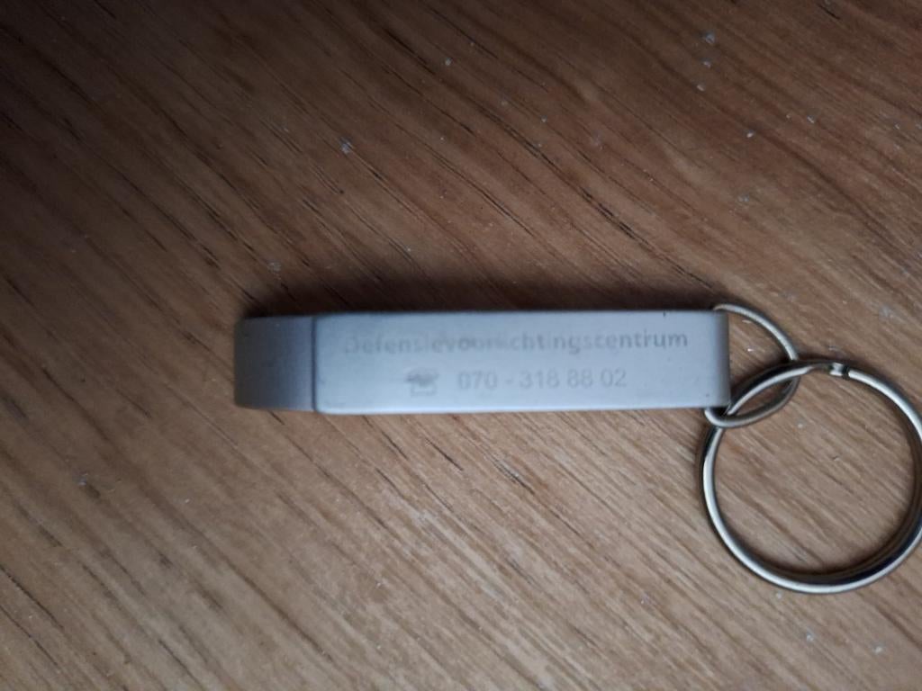Flesopener sleutelhanger Defensievoorlichtingscentrum, Ophalen of Verzenden