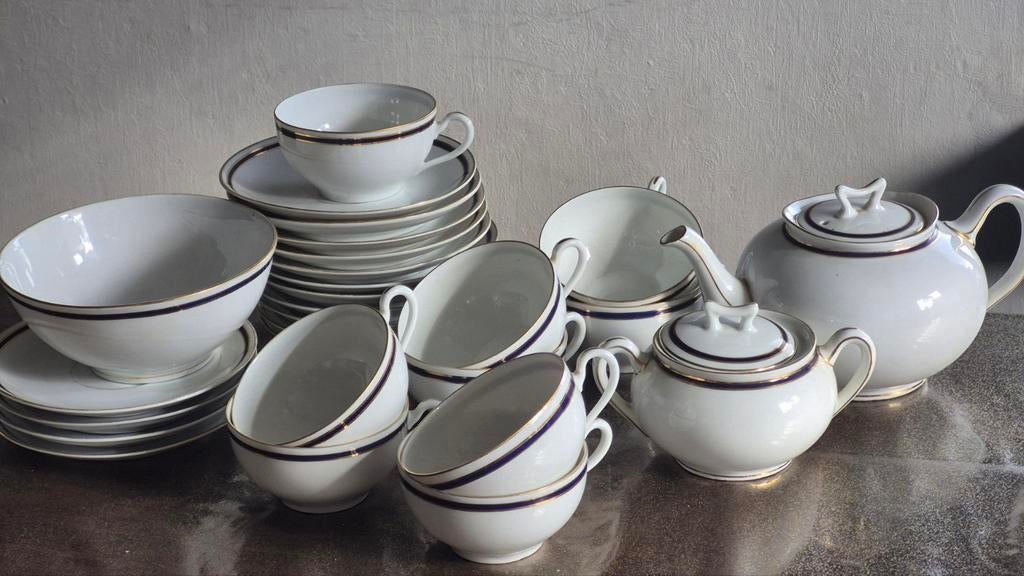 27 delig Peter Muller servies bavaria 22 wit blauw en goud, Ophalen, Zo goed als nieuw, Porselein, Compleet servies