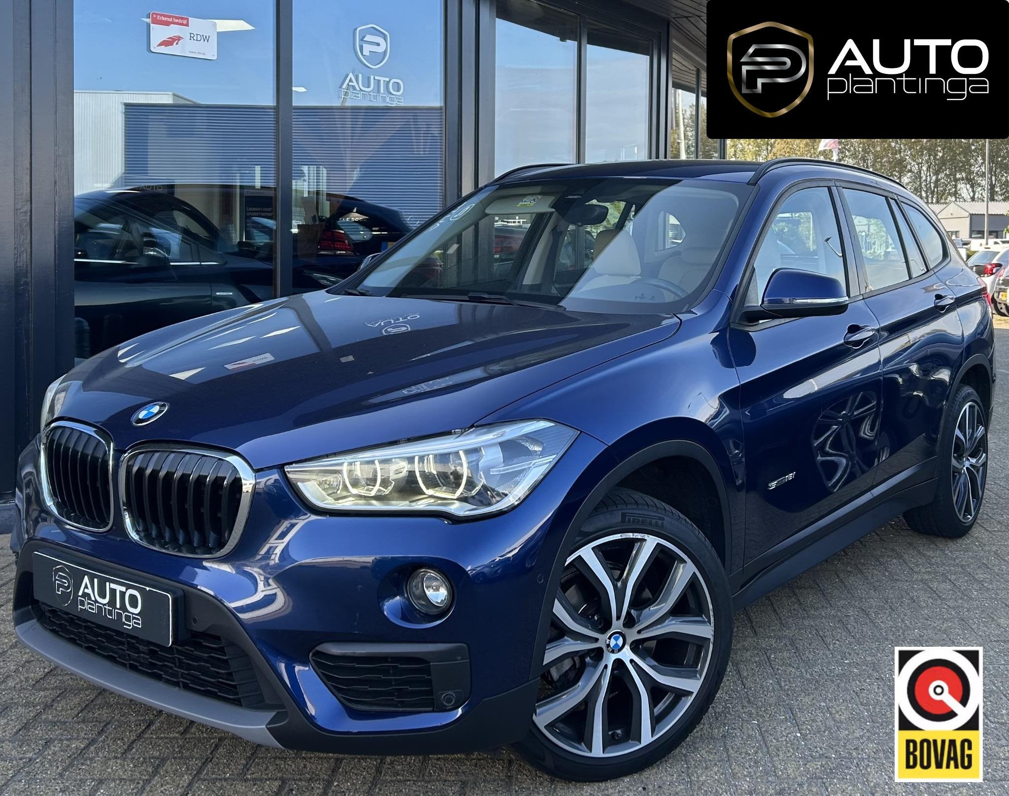 BMW X1 sDrive18i High Executive | NL AUTO | Automaat | Achte, Auto's, 136 pk, Gebruikt, Blauw, 19 km/l