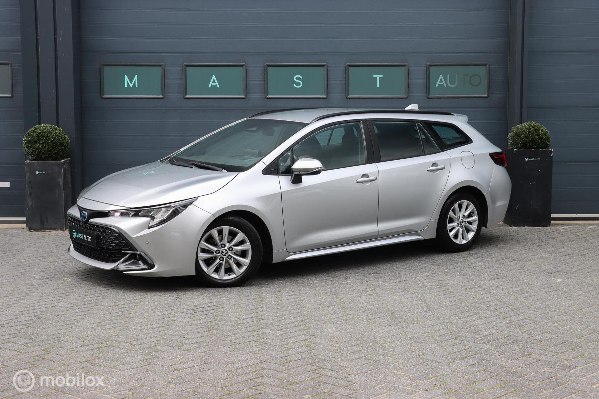 Toyota Corolla Touring Sports Hybrid Business|ACC|SPORTSTOEL, Auto's, Stof, Gebruikt, Zwart, 4 cilinders