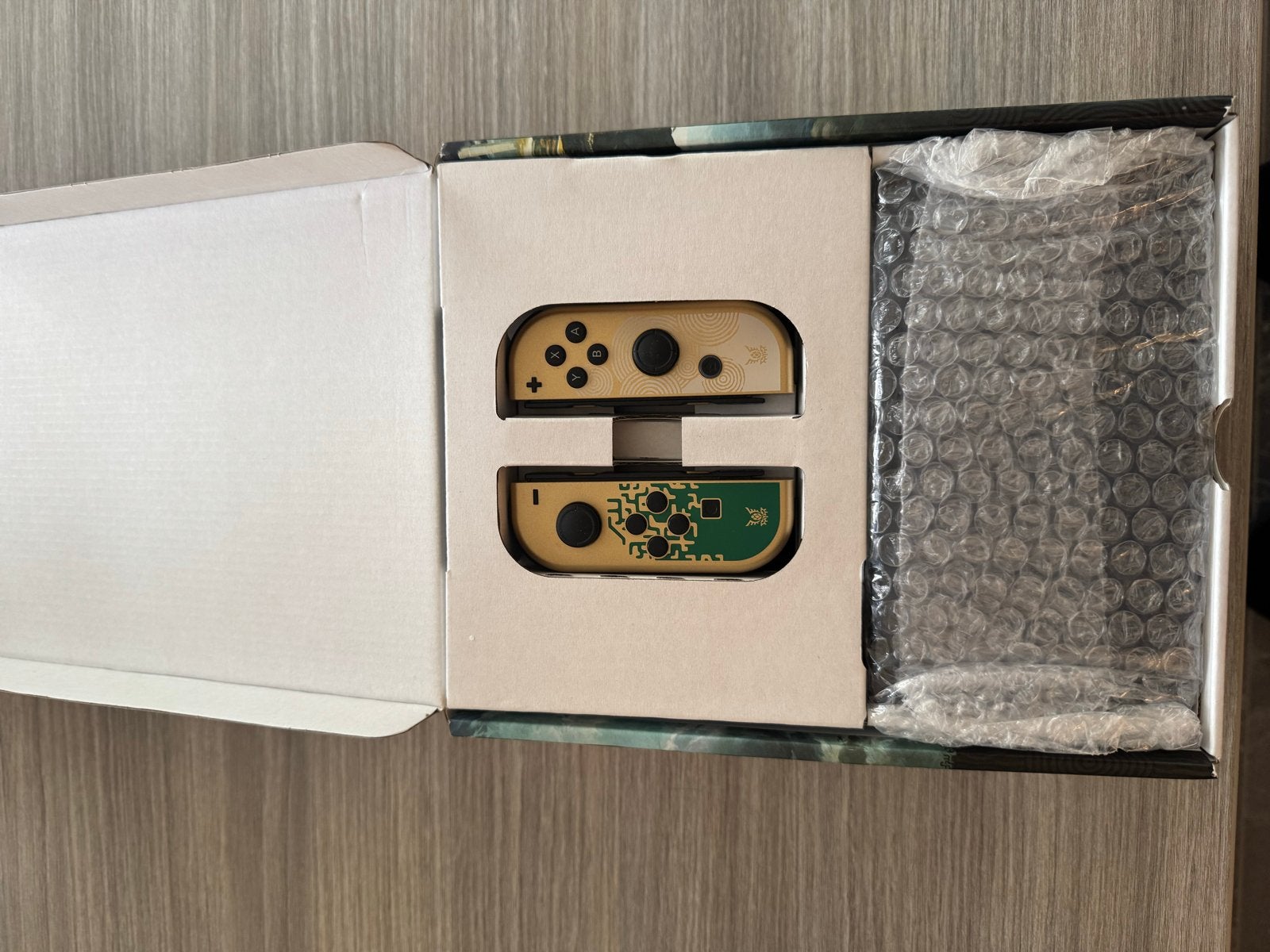 Foto 3 van Nintendo Switch OLED Zelda Editie - Zo goed als nieuw