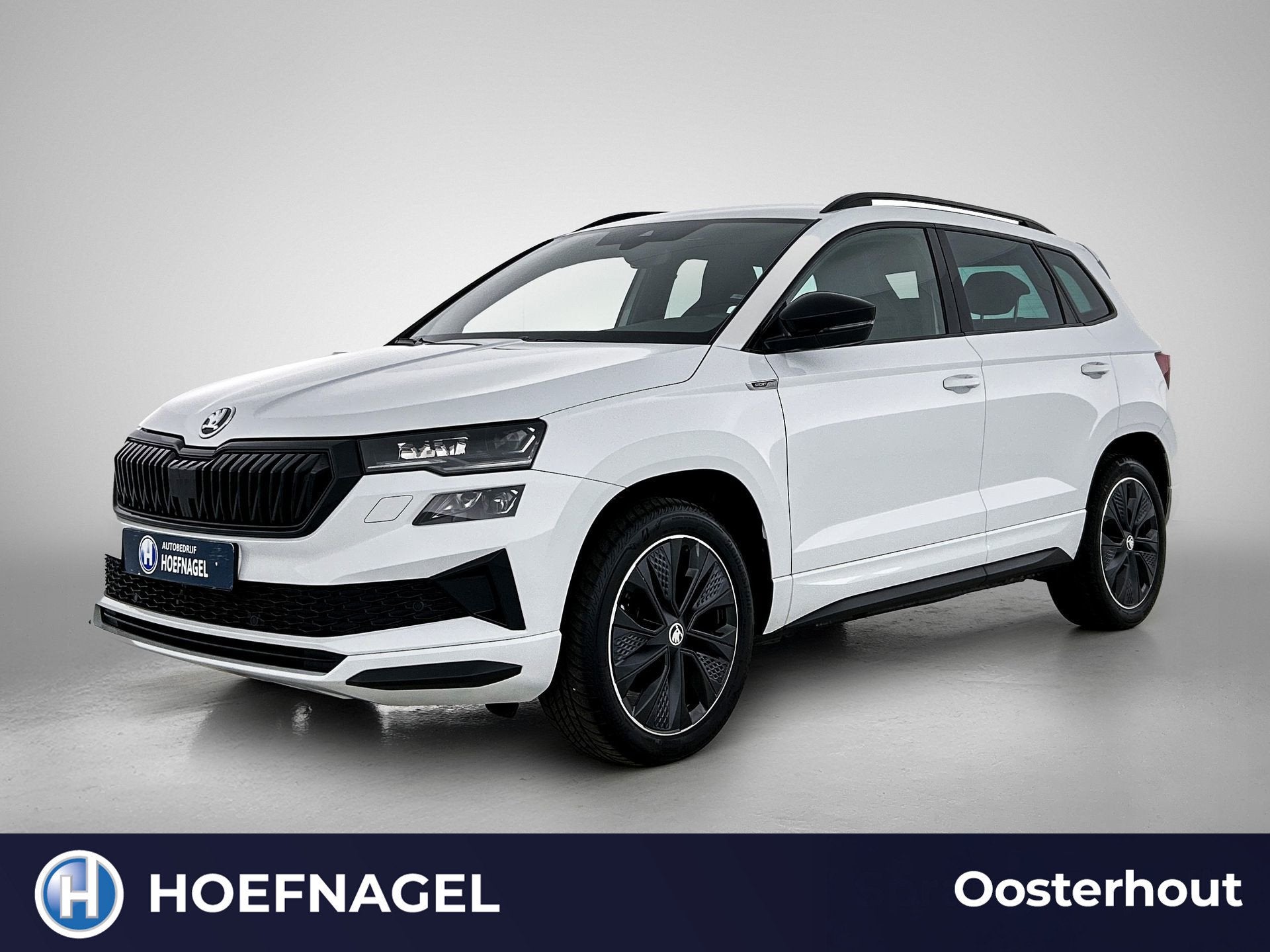 Skoda Karoq 1.5 TSI ACT Sportline Business | Automaat | Adap, Auto's, Skoda, Stof, Zwart, 4 cilinders, Wit