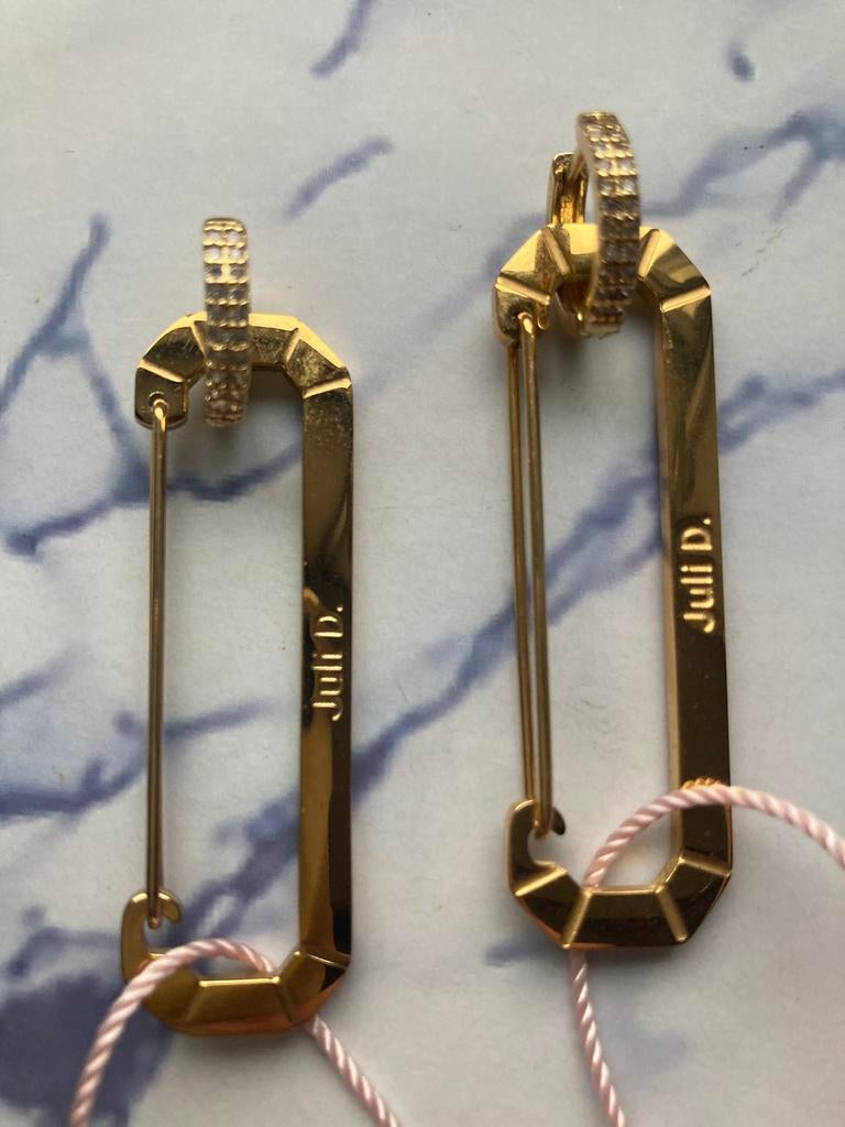 JULI DANS LANGE GOUDKLEURIGE “BONNE” OORBELLEN, Overige materialen, Hangers, Nieuw, Ophalen of Verzenden