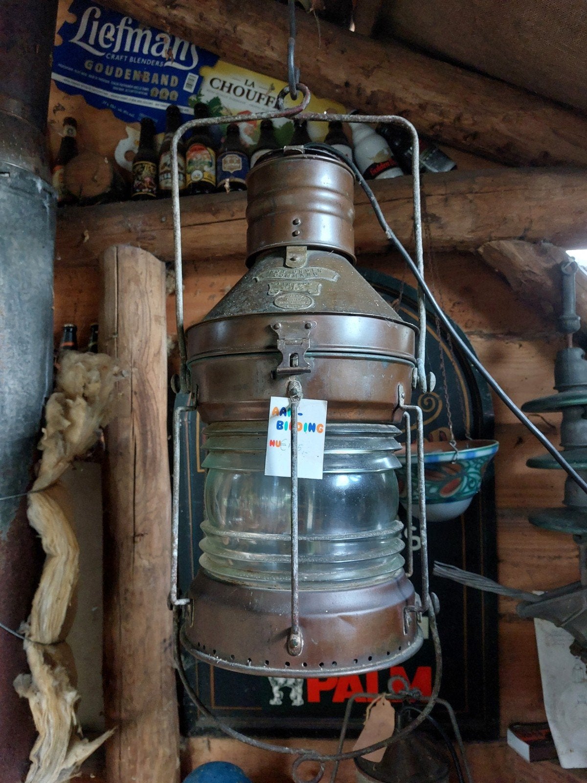 Pracht van een scheepslamp, Ophalen