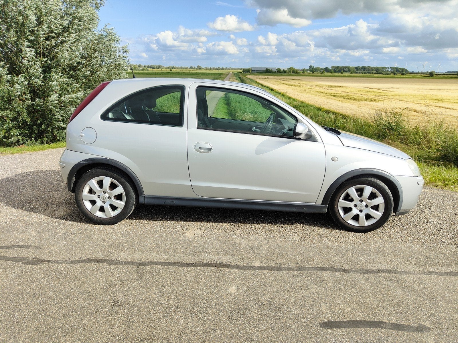 Opel Corsa 1.2 16V Twinport 3D 2005 Grijs, Auto's, Voorwielaandrijving, 450 kg, 31 €/maand, 4 cilinders