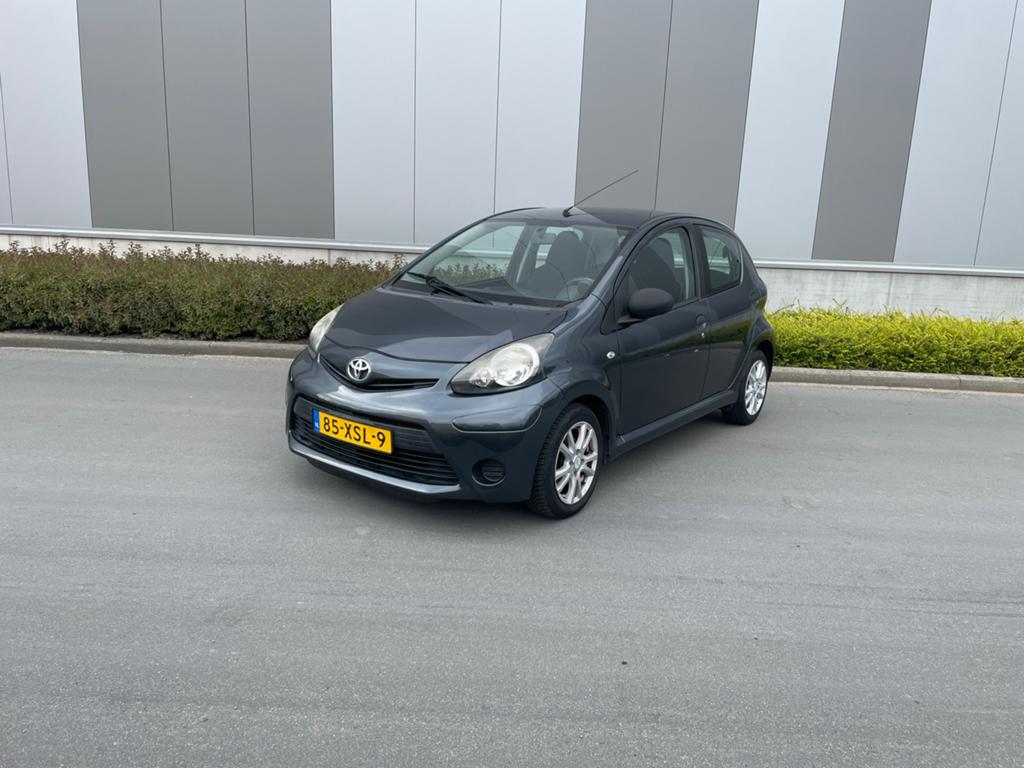 Toyota Aygo 1.0 12V Vvt-i 5DRS 2012 Grijs, Auto's, Toyota, Particulier, Aygo, ABS, Airbags, Airconditioning, Alarm, Centrale vergrendeling