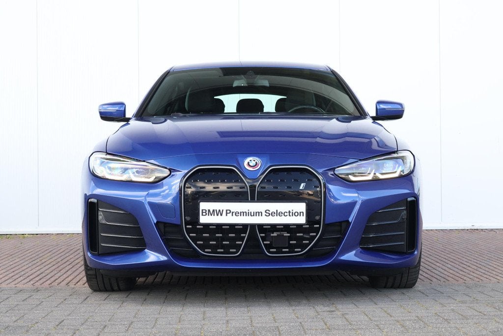 BMW i4 eDrive40 84 kWh | SoH 99% | M-SPort Pakket | Stoel &, Auto's, BMW, Met garantie (alle), Blauw, 340 pk, Origineel Nederlands
