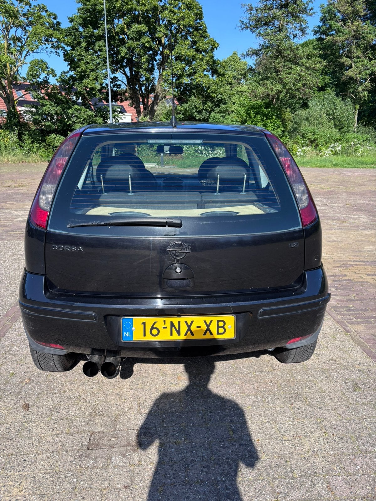 Opel Corsa 1.2 16V 3D 2004 Zwart, Auto's, Opel, Voorwielaandrijving, 450 kg, 74 pk, 31 €/maand