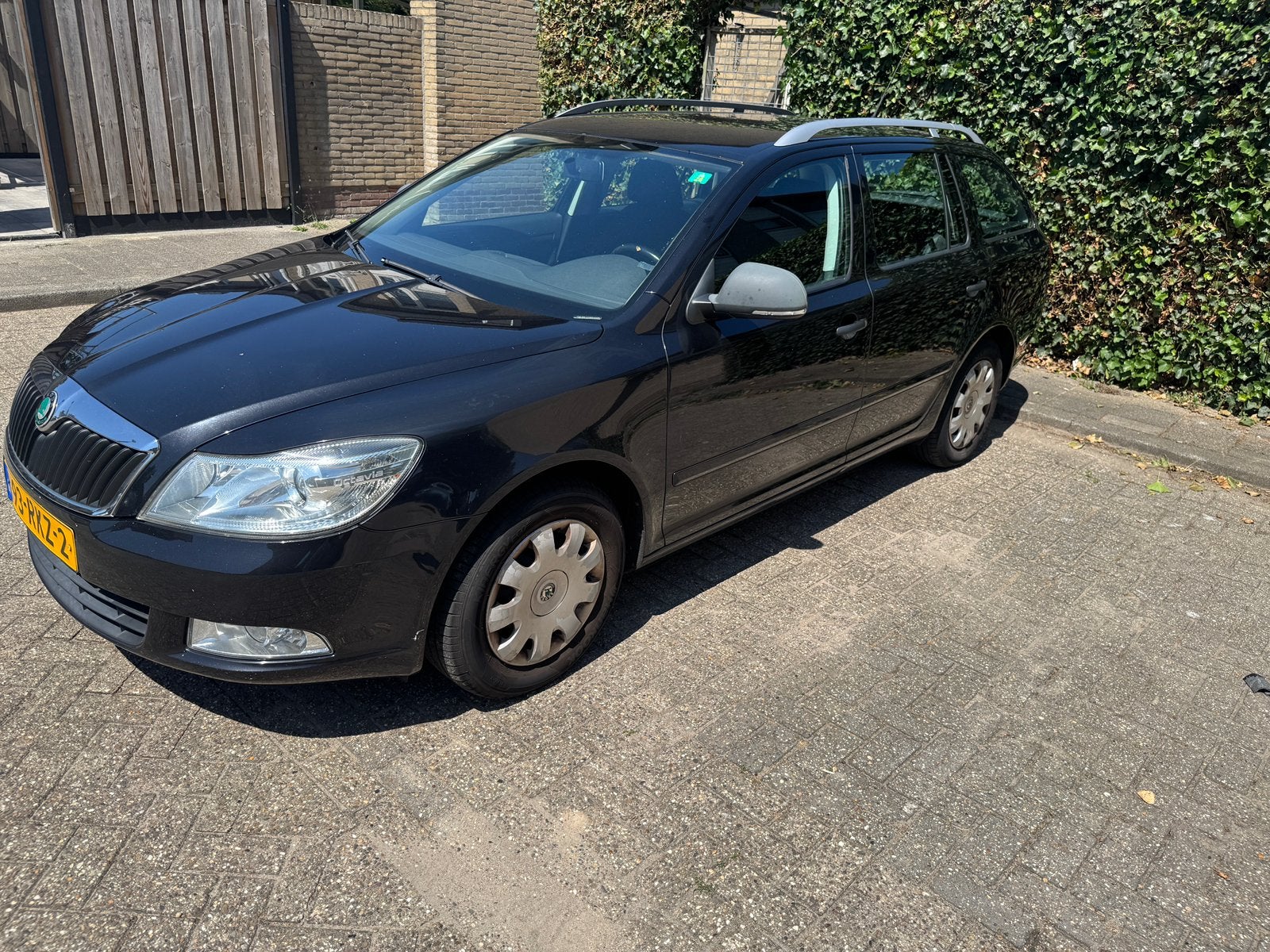 Skoda Octavia Combi 1.2 Airco, Voorwielaandrijving, Stof, Zwart, 4 cilinders