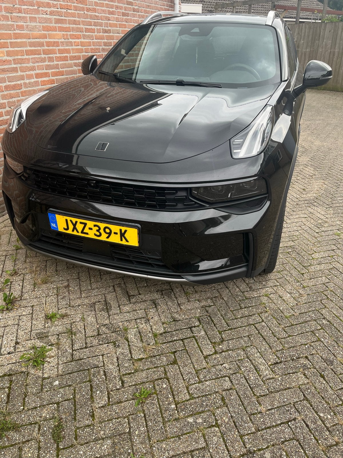Lynk & Co 1.5TD 261pk Phev 7DCTH 2023 Zwart, Auto's, 1800 kg, Zwart, 179 pk, Zwart