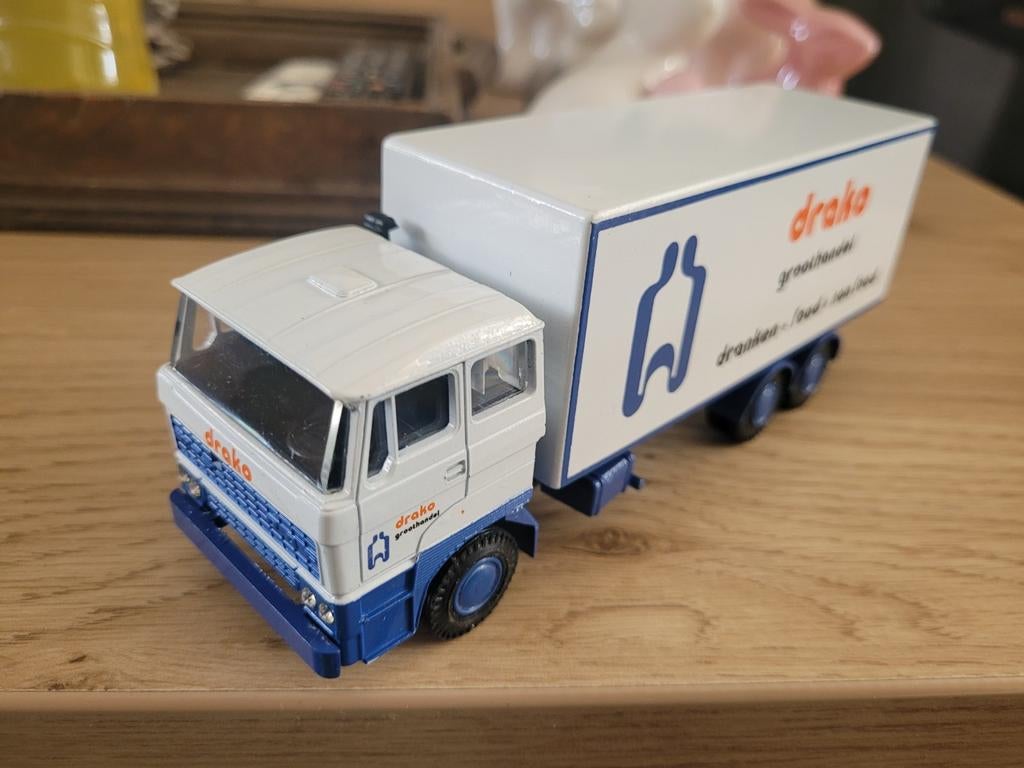 Daf bakwagen drako drankenhandel, Hobby en Vrije tijd, Modelauto's | 1:50, Nieuw, Bus of Vrachtwagen, Lion Toys, Ophalen of Verzenden