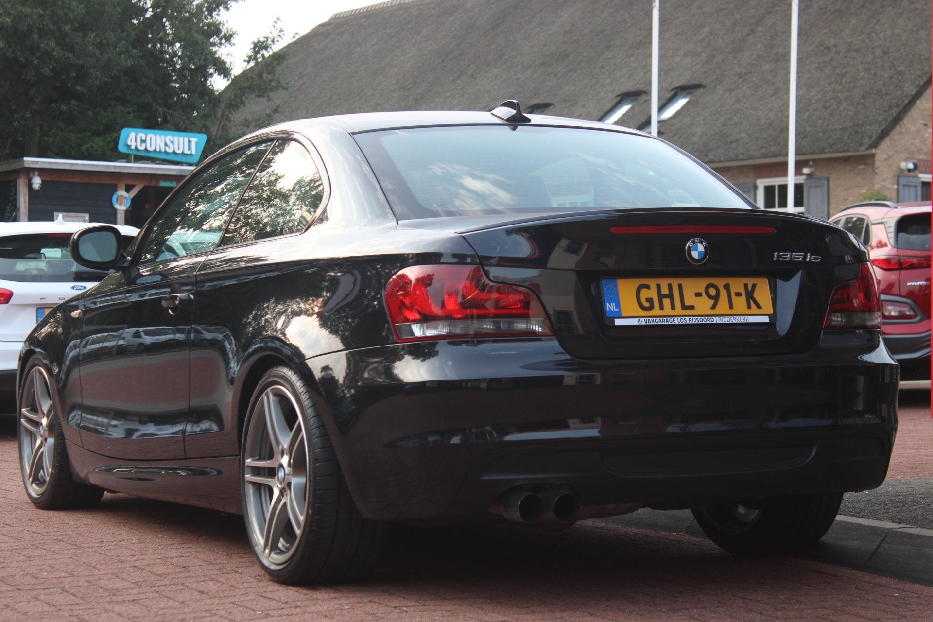 BMW 1-Serie 135i Coupé Handgeschakeld *High Executive* | Sc, Auto's, BMW, 1-Serie, Euro 5, Gebruikt, Zwart