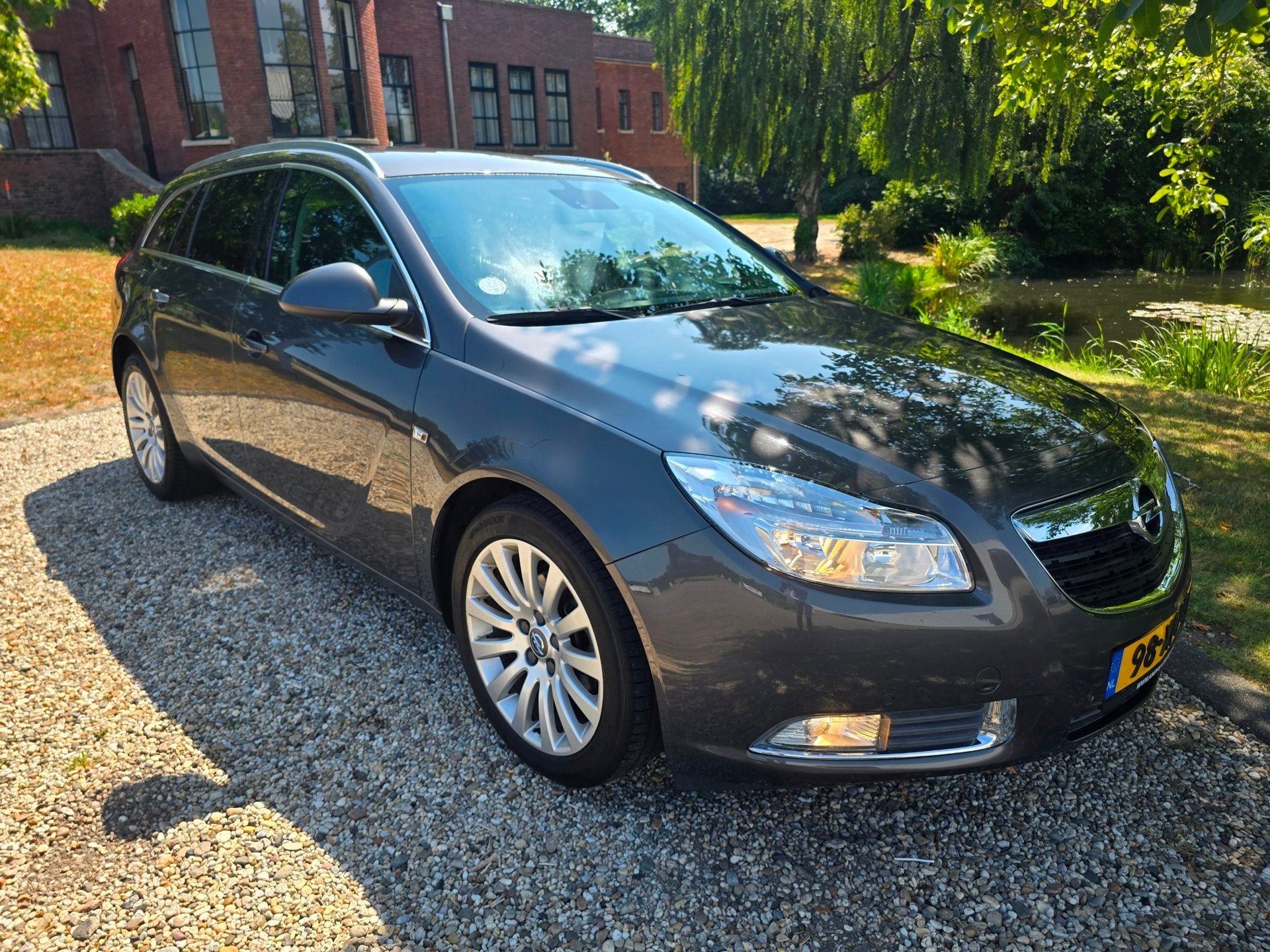 Opel Insignia Sports Tourer 1.4 Turbo EcoFLEX Edition Airco, Auto's, Opel, Euro 5, Gebruikt, 4 cilinders, Origineel Nederlands