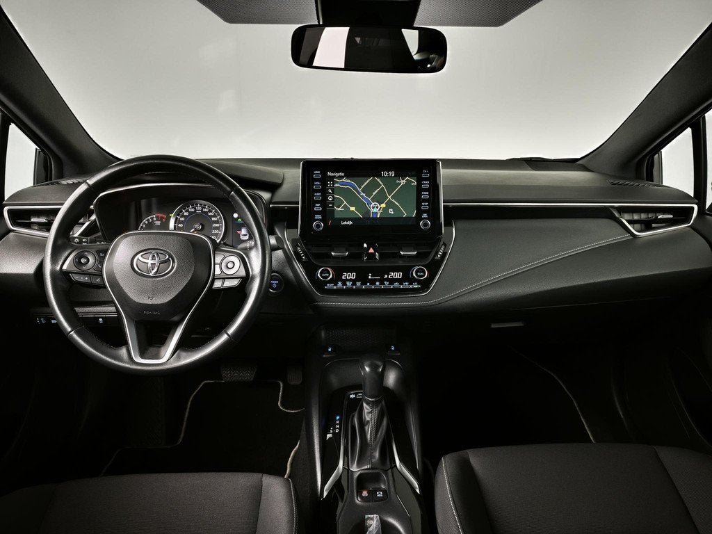 Toyota Corolla Touring Sports 2.0 Hybrid Business Intro | Na, Auto's, Toyota, 1345 kg, Gebruikt, 4 cilinders, Met garantie (alle)