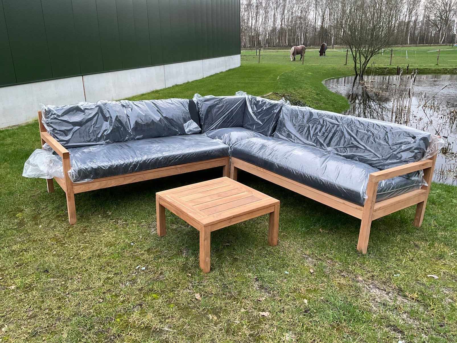 Nieuwe teak houten hoekloungeset 250 x 250, Ophalen, Zo goed als nieuw, Teakhout