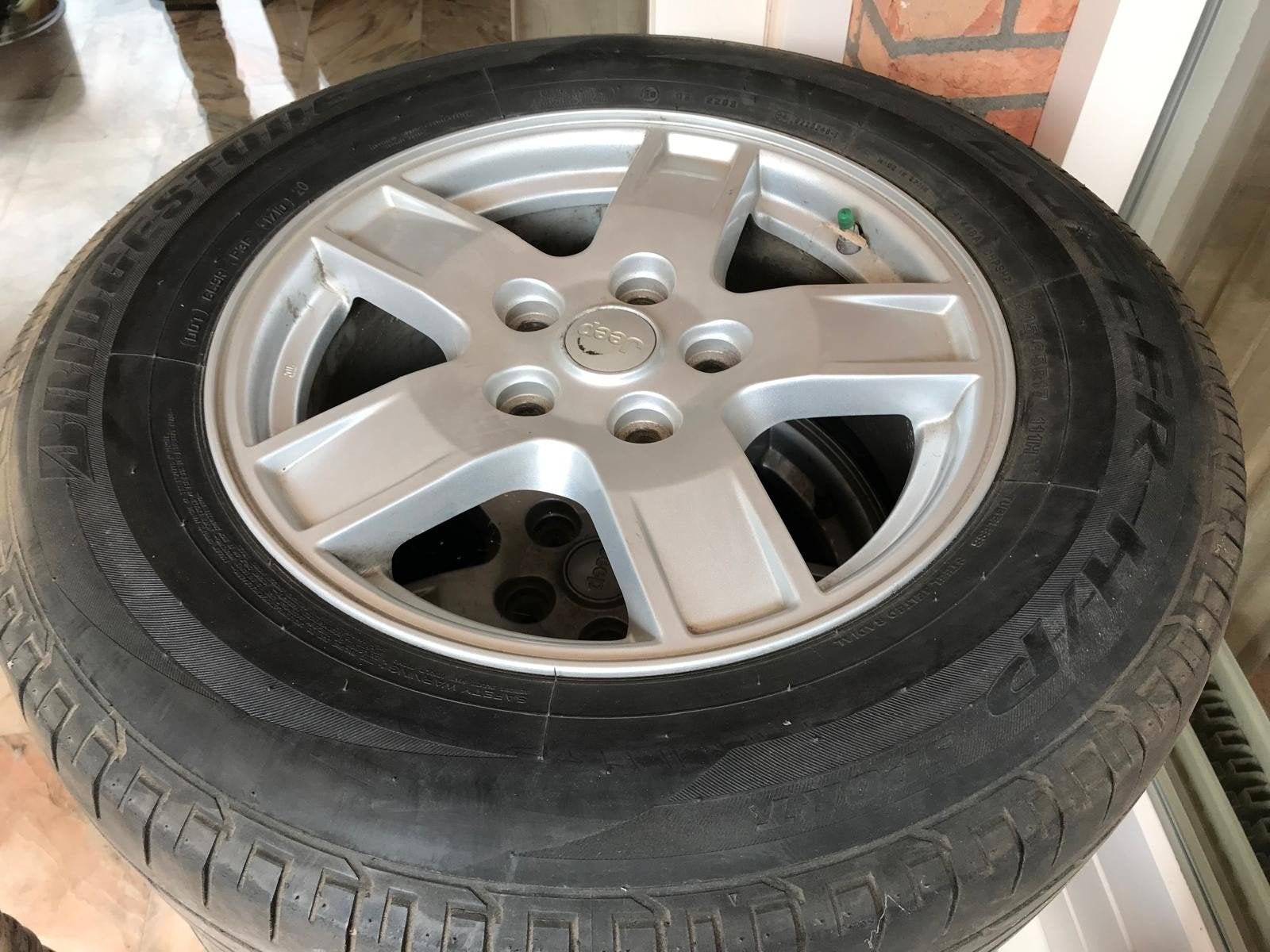 Jeep velgen met Bridgestone banden - 17 inch, Ophalen, Gebruikt