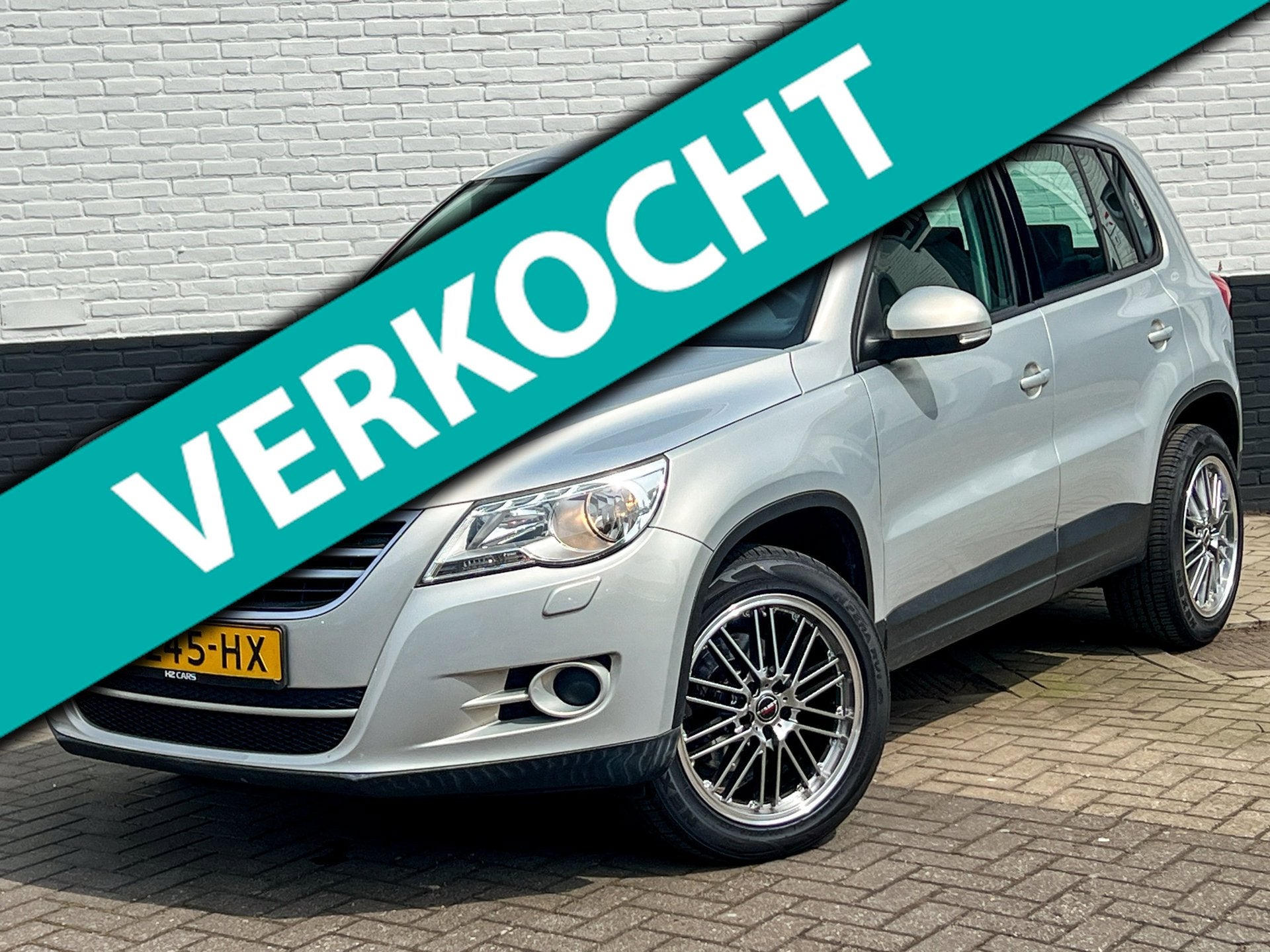 Volkswagen Tiguan 1.4 TSI Trend&Fun|Nw. Ketting|18"|Carplay|, Voorwielaandrijving, Euro 5, Stof, Zwart