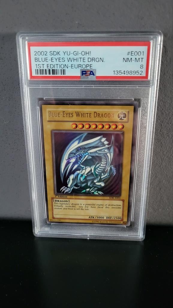 SDK Blue-Eyes White Dragon 1st Edition PSA 8, Ophalen of Verzenden, Zo goed als nieuw, Losse kaart