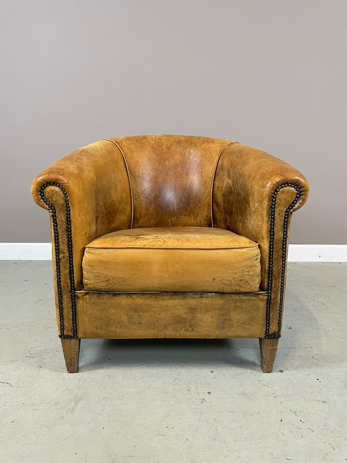 Vintage schapenleren clubfauteuil van DNG, Ophalen, Gebruikt, Leer