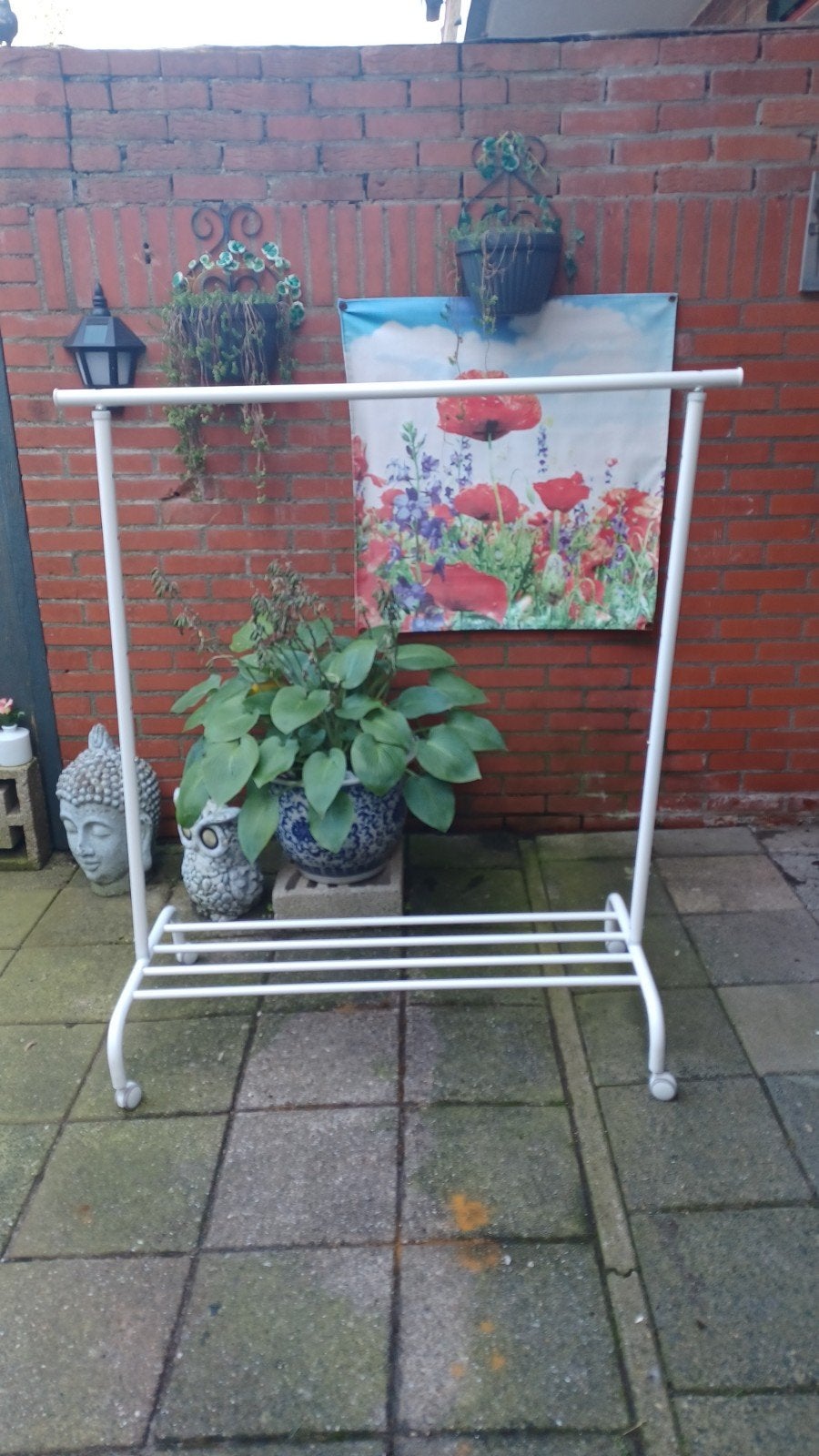 kledingrek, Ophalen, Zo goed als nieuw